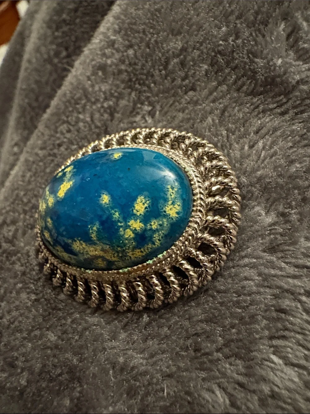 Blue and Yellow Speckled Lucite? Oval Brooch with Silver-Tone Rope Frame